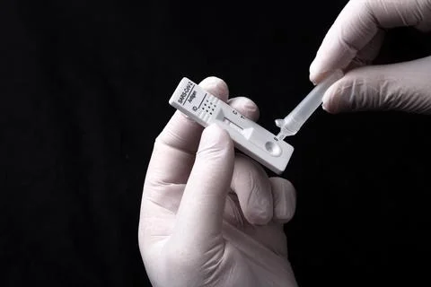 Negative test result by using rapid test device for COVID-19. Stock Photos