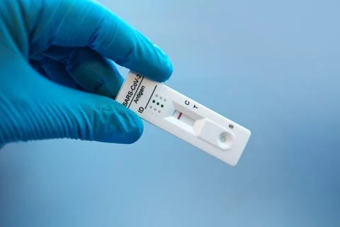 Negative test result by using rapid test device for COVID-19. Stock Photos