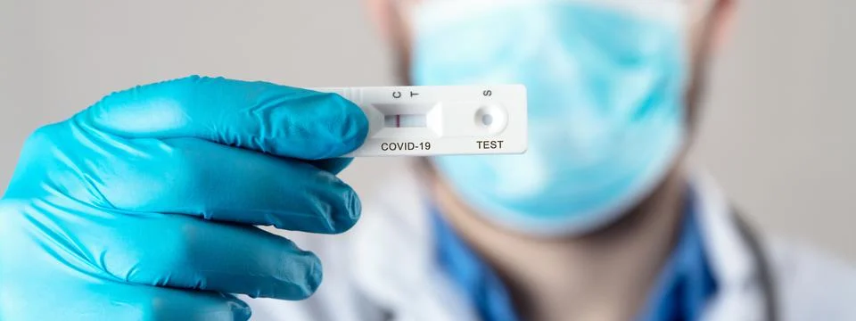 Negative test result by using rapid test device for COVID-19. Stock Photos