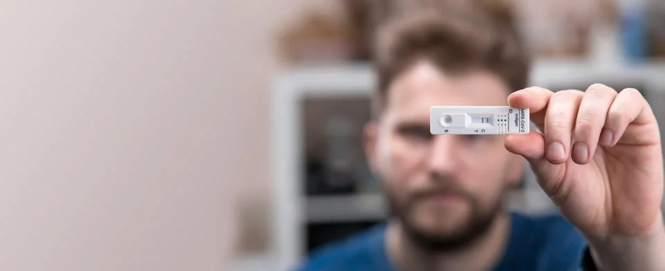 Negative test result by using rapid test device for COVID-19. Stock Photos