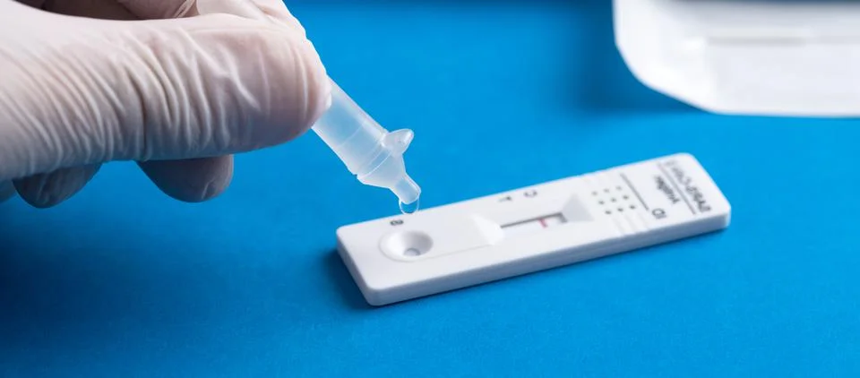 Negative test result by using rapid test device for COVID-19. Stock Photos