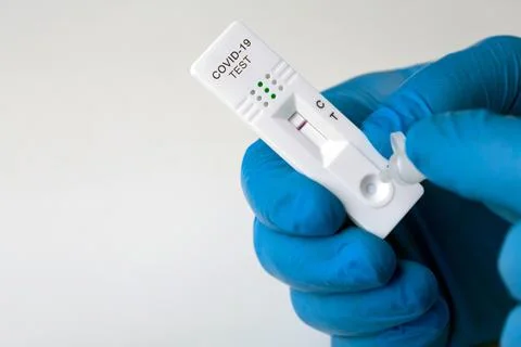 Negative test result by using rapid test device for COVID-19. Stock Photos