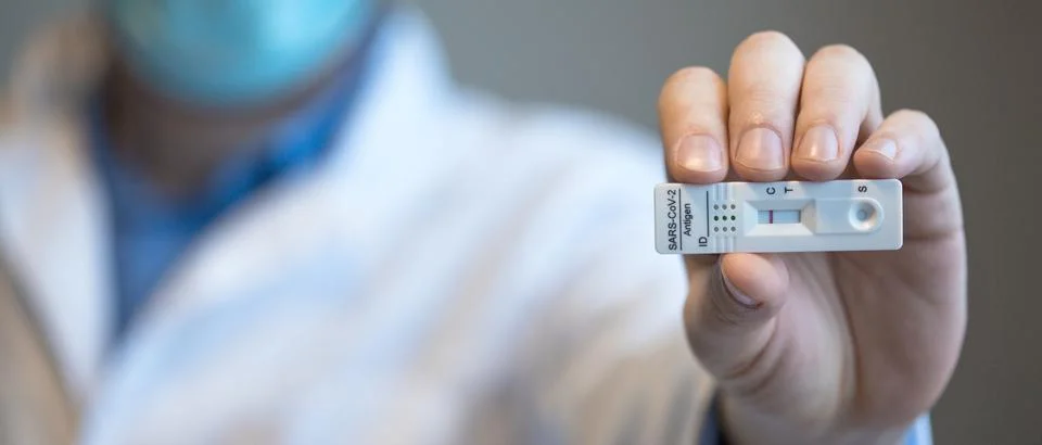 Negative test result by using rapid test device for COVID-19. Stock Photos