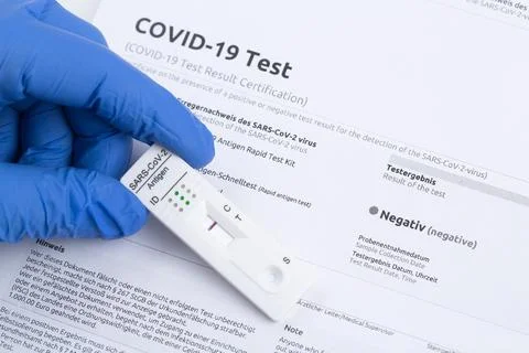 Negative test result by using rapid test device for COVID-19. Stock Photos