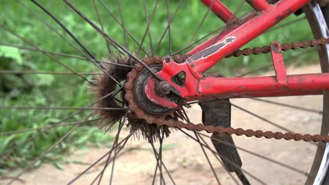 Neglected and Rusty Bike Chain Mechanism with Metal Cogwheel. Stock Footage 337372878