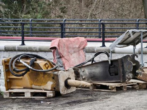 Neglected Construction Area Featuring Corroded Machinery And Discarded Mate.. Stock Photos
