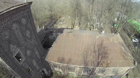 Neglected edifice with tower at spring sunny day. Aerial view Stock Footage 41763451