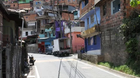 Neighborhood in Medellin, Colombia with motorcycle Stock Footage