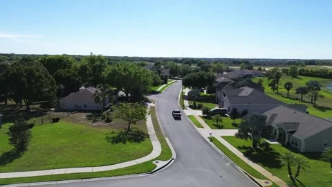 Neighborhood Motion: A Drone's Eye View of a Truck's Journey Stock Footage 240940098