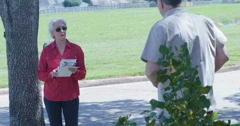 Neighbors talking and keeping social distance Stock Footage