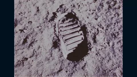 Neil Armstrong carries the lunar dust and rock samples of moon - 1969 Stock Footage