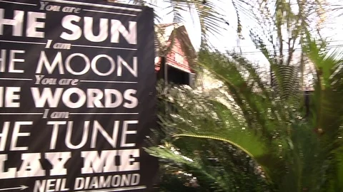 Neil Diamond quote on poster during SXSW Austin Texas Stock Footage 82912262