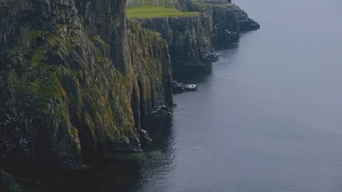 Neist point lighthouse on the cliffs Isle of Skye, Scotland, United Kingdom Video stock 93258264