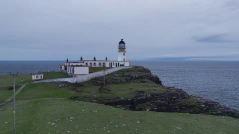 Neist Point Lighthouse from a drone, Isle of Skye, Scotland, England Stock Footage 308442404