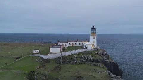 Neist Point Lighthouse from a drone, Isle of Skye, Scotland, England Stock Footage 308442440
