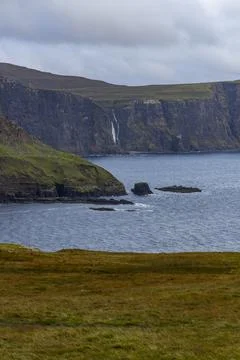 Neist Point at sunset, lighthouse, dramatic cliffs. Isle of Skye Foto stock