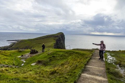Neist Point at sunset, lighthouse, dramatic cliffs. Isle of Skye Stock Photos