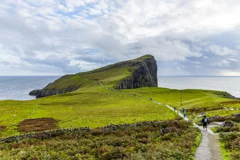 Neist Point at sunset, lighthouse, dramatic cliffs. Isle of Skye Foto stock