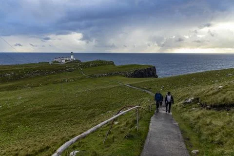 Neist Point at sunset, lighthouse, dramatic cliffs. Isle of Skye Stock Photos