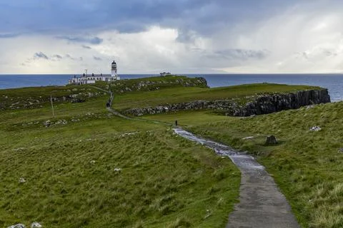 Neist Point at sunset, lighthouse, dramatic cliffs. Isle of Skye Foto stock