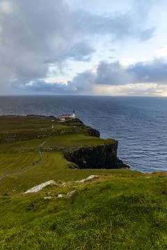 Neist Point at sunset, lighthouse, dramatic cliffs. Isle of Skye Foto stock