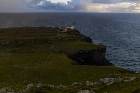 Neist Point at sunset, lighthouse, dramatic cliffs. Isle of Skye Stock Photos