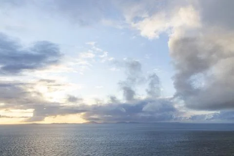 Neist Point at sunset, lighthouse, dramatic cliffs. Isle of Skye Stock Photos