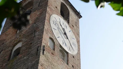 Neive, close up on medieval clock tower Stock Footage 79426809