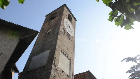 Neive, looking up at medieval clock tower Stock Footage 79414834