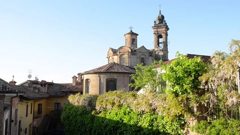 Neive, panoramic view of the church at sunset light Stock Footage 79287597