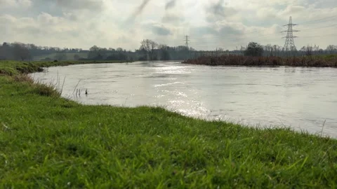 The Nene River running fast Stock Footage 328049499