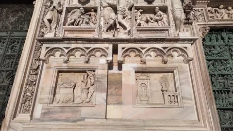 Neo-classical copper door of Milan's greatest cathedral Stock Footage 314583944
