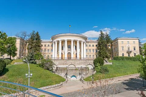 Neoclassical building with columns, pediments, numerous windows, and a ston.. Stock Photos