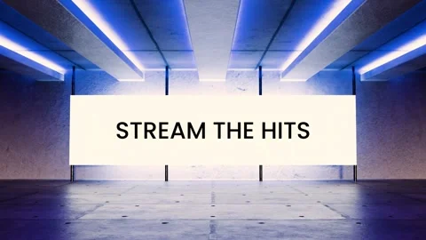 Neon blue digital screen displays the phrase “Stream the Hits” Stock Footage 312544214