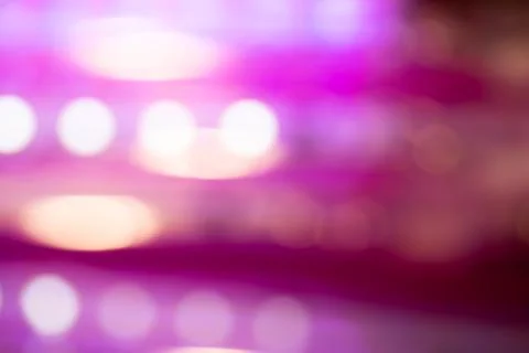 Neon bokeh background with various lines and circles. Blurry night lights retro Stock Photos