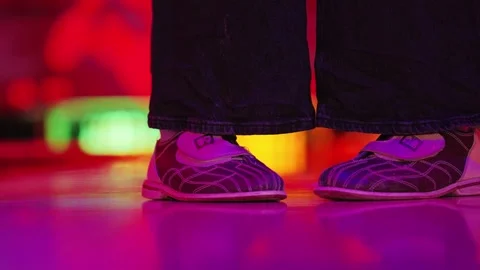 Neon Bowling Shoes Dancing Under Colorful Lights In Riga Alley Stock Footage 338420718
