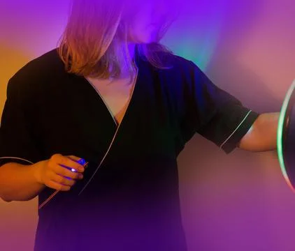 Neon bright colorful studio lights and bokeh effects on creative organizer of Stock Photos