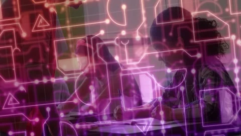 Neon circuit overlay sweeping frames, revealing adult guiding teens writing at Stock Footage 331197609