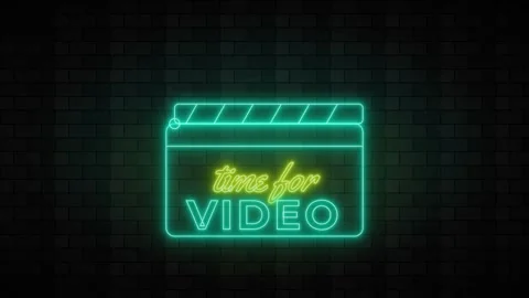 Neon Clapperboard With Message Against A Dark Brick Wall Stock Footage 330975961
