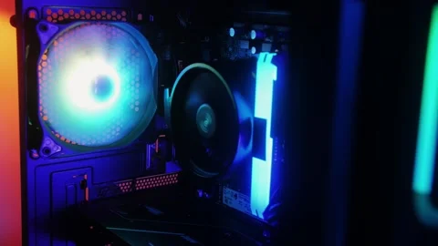 Neon colorful pc processor cooler rotating close-up. Neon system unit, computer Stock Footage 273338167