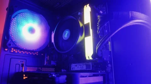 Neon colorful pc processor cooler rotating close-up. Neon system unit, computer Stock Footage 273340524