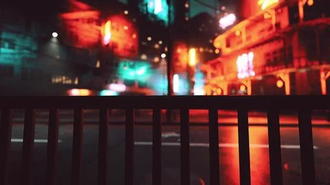 Neon colors leave a lasting impression on this small Asian town after sunset Stock Illustration