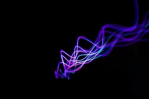 Neon design elements lights glow and flash technology abstract background. Stock Photos