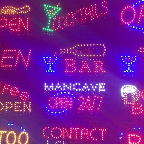 Neon disco lights funfair fairground ride rainbow lights Stock Footage 98648804
