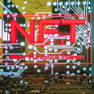 Neon glowing letters nft on the background of computer parts. cryptoart conce Illustrazione stock