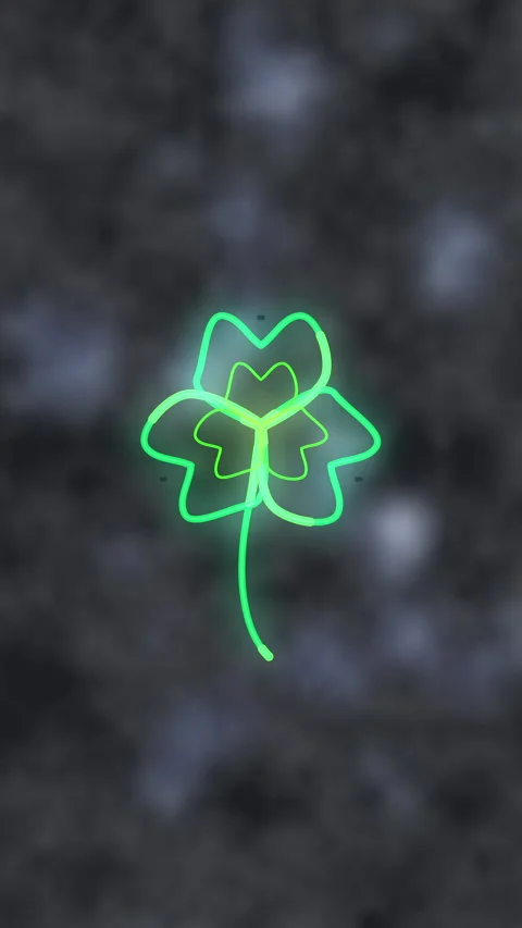 Neon green clover glowing in dark loop animation Stock Footage 346544240