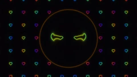Neon heart pattern with a glowing angry face in the center Stock Footage 338294980