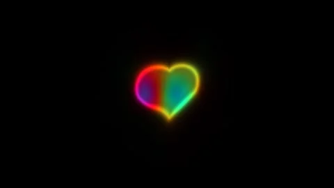 Neon heart shape glowing on dark background with colorful Stock Footage 338187890