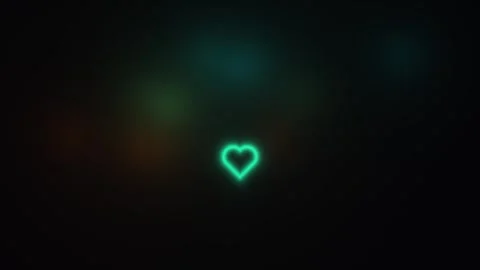 Neon heart shape glows in dark background with light Stock Footage 338182818