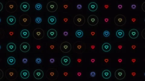 Neon heart shapes moving in a pattern on a dark background Stock Footage 338203398